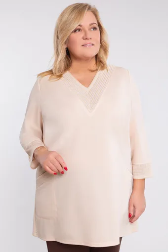 Tunica beige con tasche