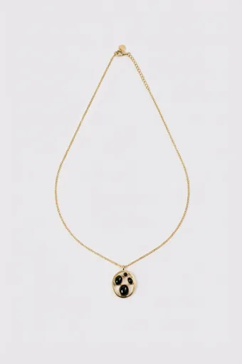 collana d'oro con ciondolo nero e oro
