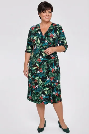 Abito con foglie tropicali verdi