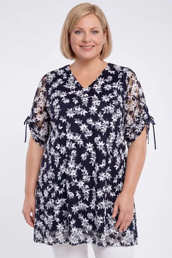 Tunica di pizzo blu navy con fiori bianchi