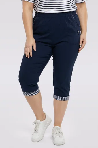 Pantaloni blu navy con polsini a cinture