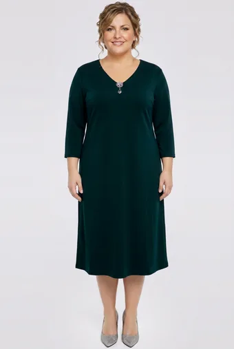 Abito elegante verde scuro con spilla