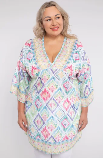 poncho colorato in una tonalità di verde chiaro
