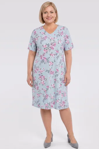 Un semplice vestito verde chiaro con fiori rosa