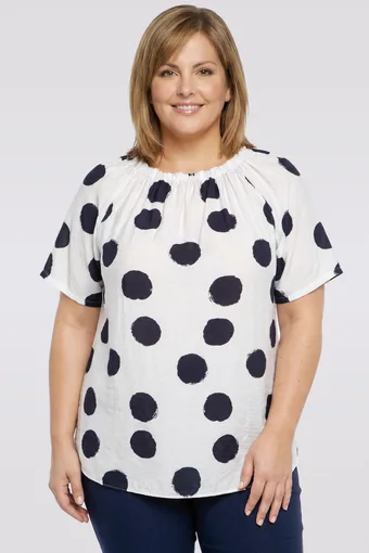 Camicetta bianca a pois blu navy