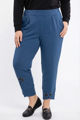 Pantaloni blu 7/8 con fiori argentati