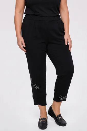 Pantaloni neri 7/8 con fiori argentati