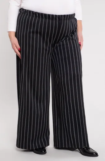 Pantaloni neri con strisce bianche
