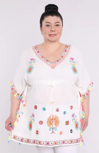 Poncho bianco con fantasie colorate
