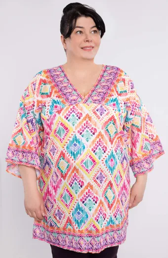 Poncho colorato in tonalità rosa