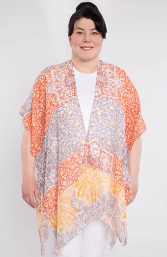 poncho arancione e beige con foglie bianche