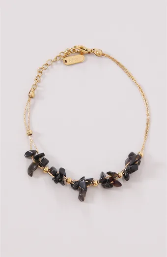 bracciale di perline nere sottili