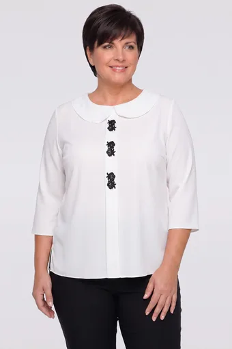 Camicetta bianca con ricami decorativi