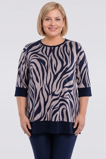 Tunica calda blu navy con motivi blu navy e beige.