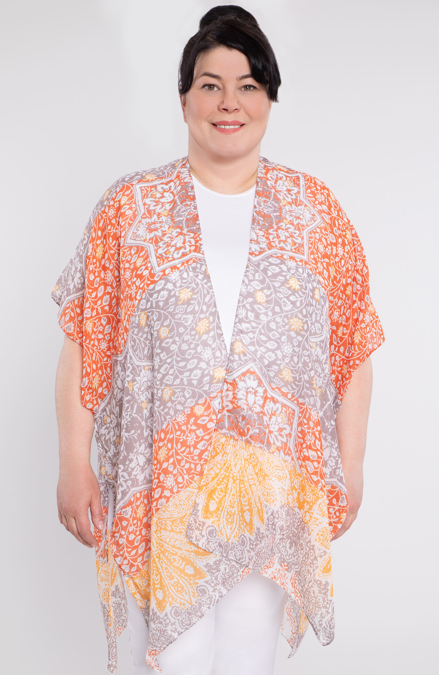 cardigan arancione e beige con foglie bianche